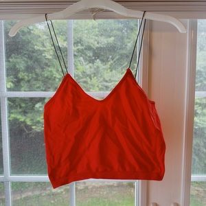 Bright orange south moon under tank top!